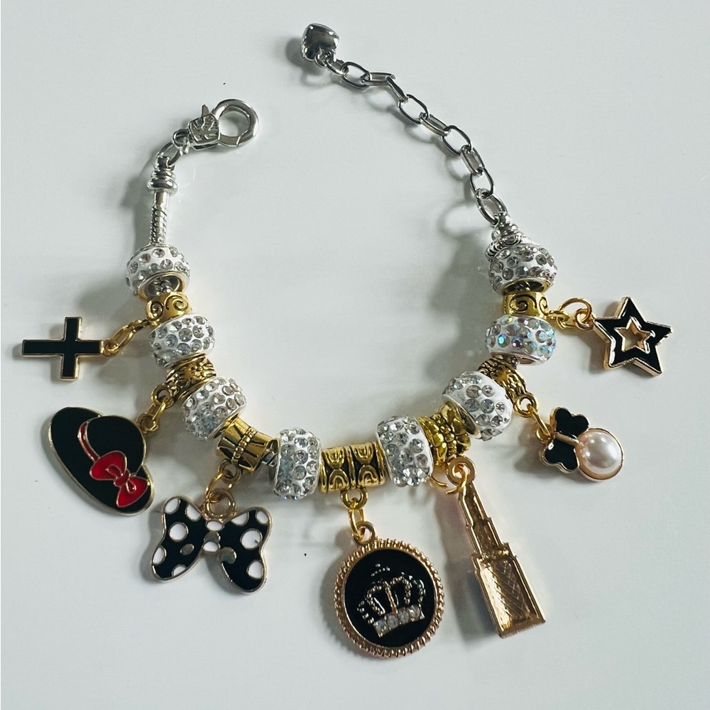 Charming Gold and Black Charm Bracelet